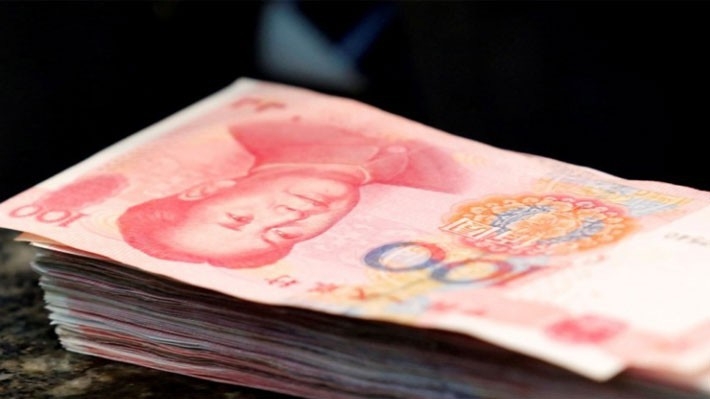 Tính đến ngày 3/7, đồng Nhân dân tệ đã giảm giá 14 phiên liên tục, với tổng mức giảm 5,4% - Ảnh: Reuters/SCMP.