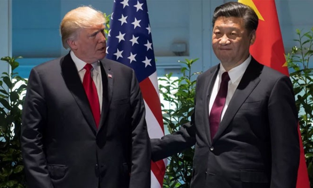 Tổng thống Mỹ Donald Trump (trái) và Chủ tịch Trung Quốc Tập Cận Bình tại cuộc gặp bên lề thượng đỉnh G20, tháng 7/2017 - Ảnh: Reuters.