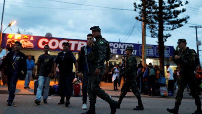 Binh sỹ Brazil tuần tra ở khu vực biên giới nước này với Venezuela - Ảnh: Reuters.