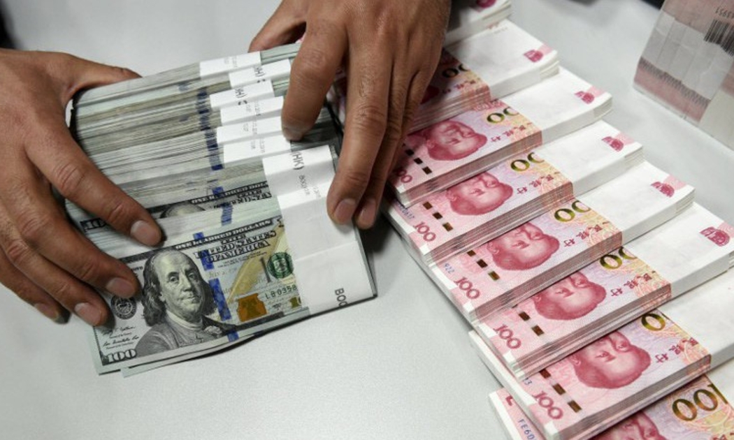Phá giá Nhân dân tệ đi kèm nhiều rủi ro đối với kinh tế Trung Quốc - Ảnh: Reuters.