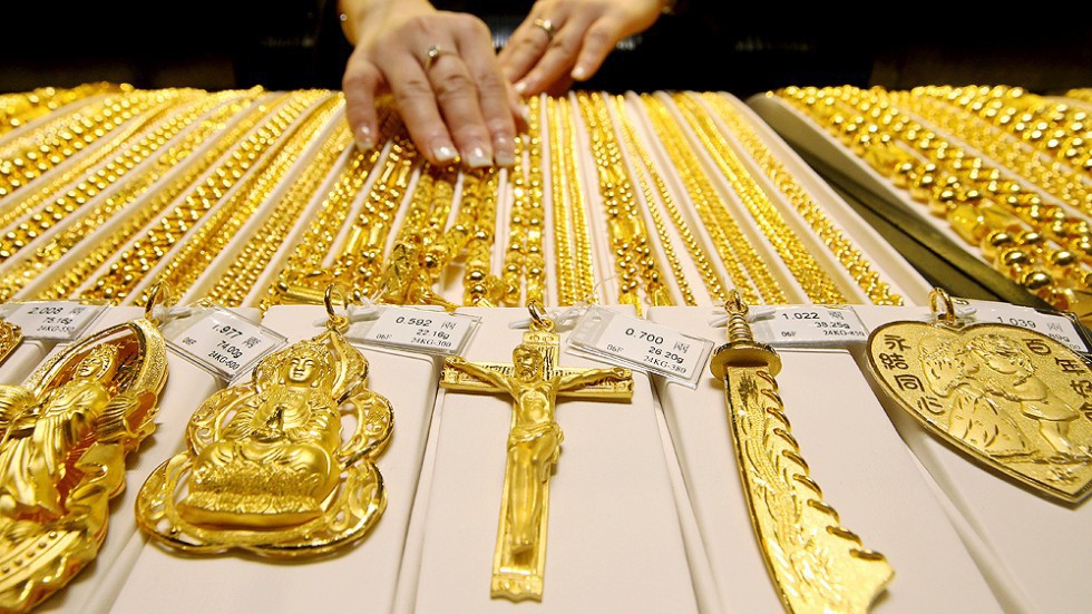 Giá vàng thế giới gần đây lình xình quanh ngưỡng 1.200 USD/oz - Ảnh: SCMP.