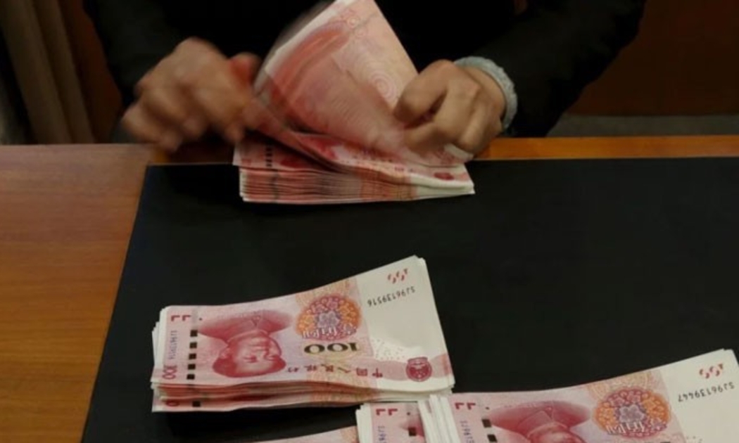 Nếu đồng Nhân dân tệ giảm giá thêm 10%, thì đó sẽ là một sự phủ nhận đối với những nỗ lực bình ổn tỷ giá thời gian qua của Bắc Kinh - Ảnh: Reuters/SCMP.