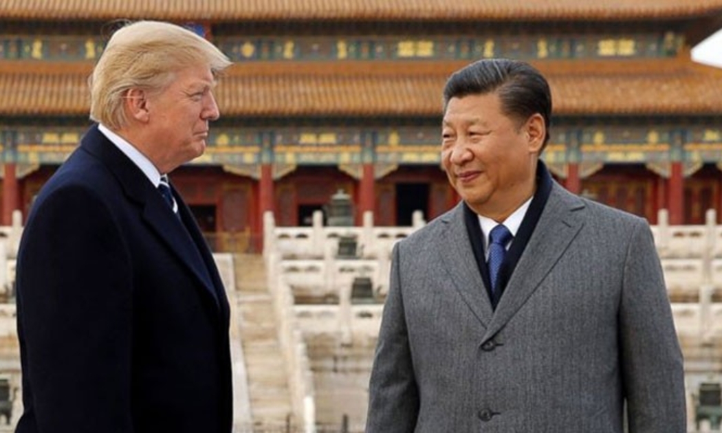 Tổng thống Mỹ Donald Trump (trái) và Chủ tịch Trung Quốc Tập Cận Bình trong chuyến thăm Bắc Kinh của ông Trump tháng 11/2017 - Ảnh: Reuters.