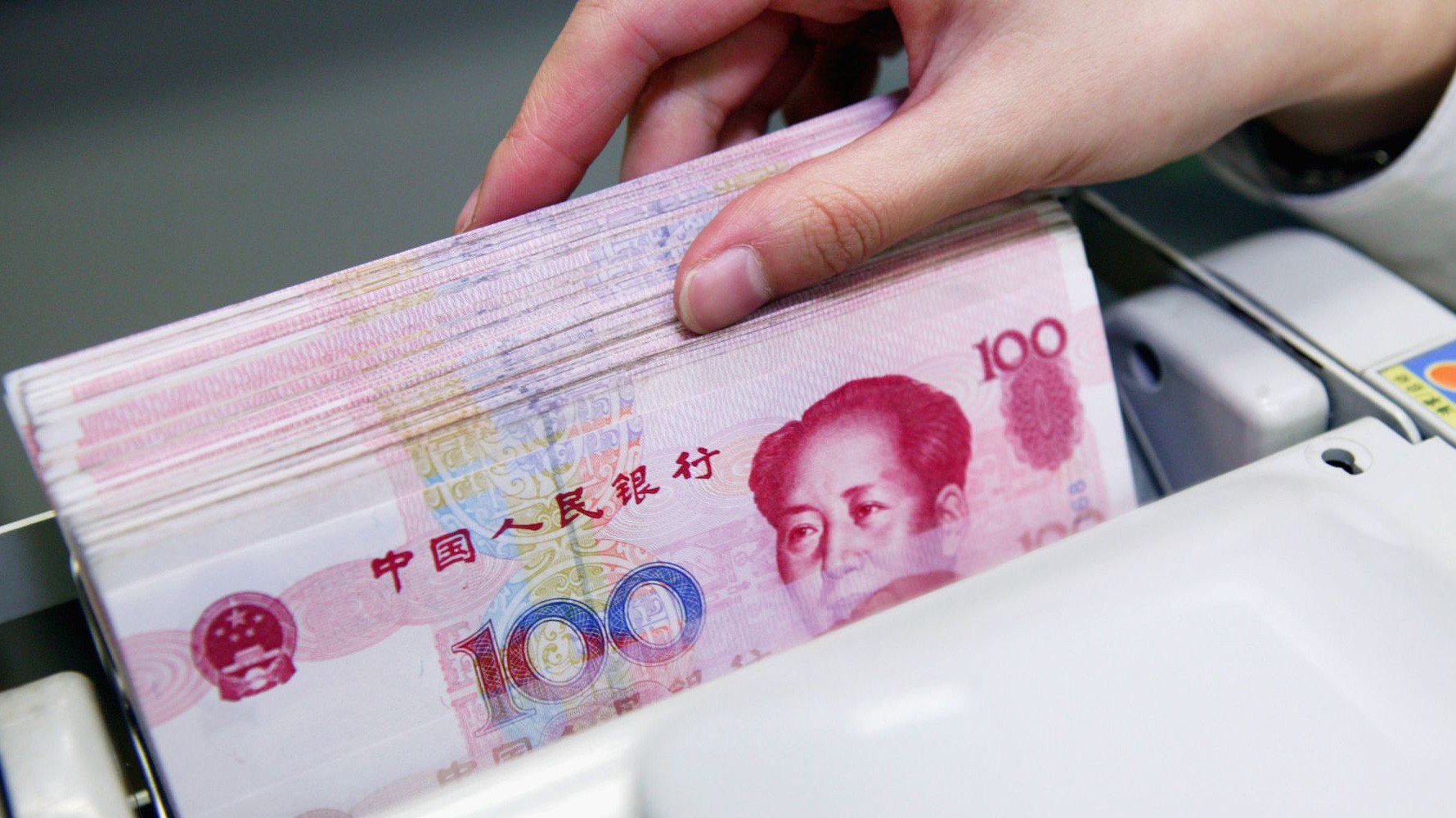Thị trường đang chờ xem liệu Nhân dân tệ có rớt qua ngưỡng 7 Nhân dân tệ đổi 1 USD, mức tỷ giá chưa từng có trong vòng 10 năm trở lại đây - Ảnh: Getty/CNBC.