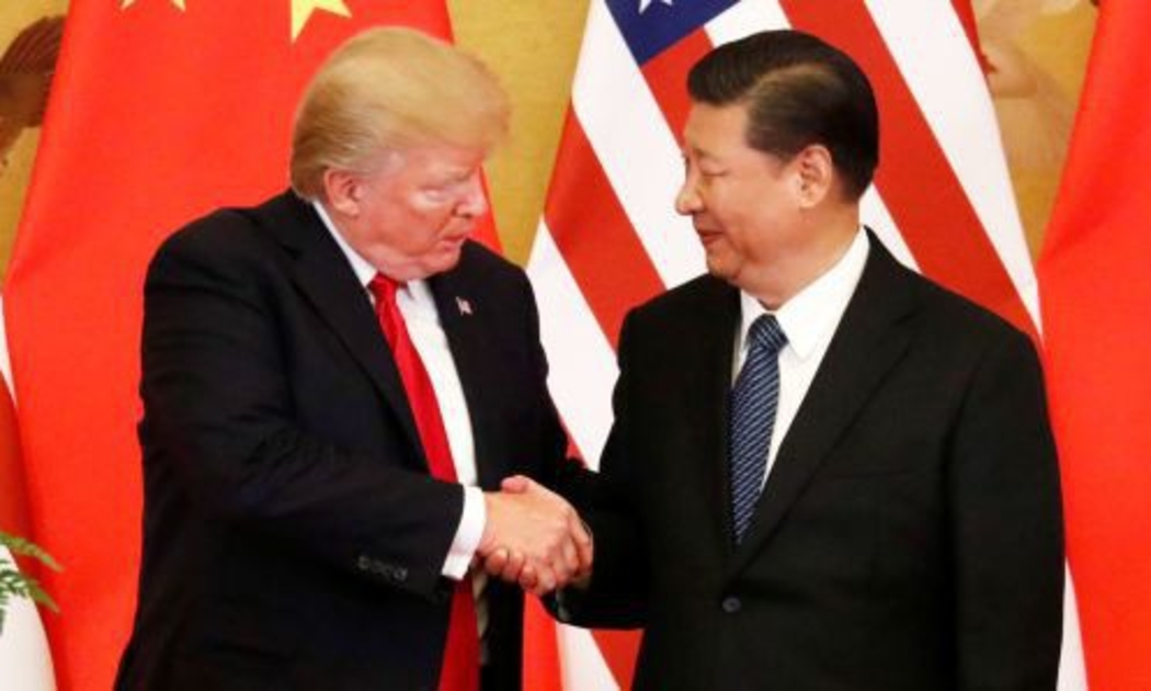 Tổng thống Mỹ Donald Trump (trái) và Chủ tịch Trung Quốc Tập Cận Bình trong cuộc gặp ở Bắc Kinh hồi tháng 11/2017 - Ảnh: Reuters/CNBC.