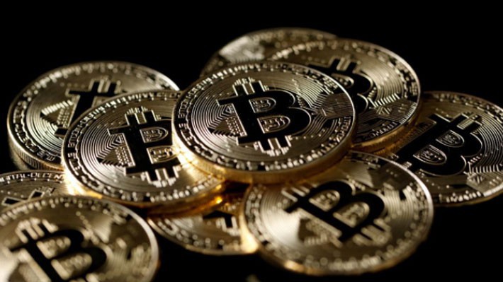 Cùng với sự sụt giá của Bitcoin, giá trị giao dịch của đồng tiền kỹ thuật số này cũng giảm chóng mặt - Ảnh: Reuters.
