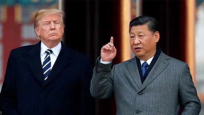 Tổng thống Mỹ Donald Trump (trái) và Chủ tịch Trung Quốc Tập Cận Bình trong chuyến thăm Bắc Kinh của ông Trump vào tháng 11/2017 - Ảnh: Reuters/SCMP.