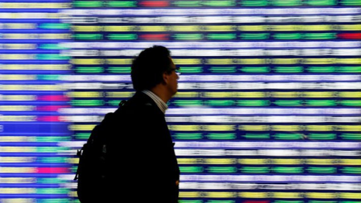 Phiên tăng này của chứng khoán châu Á là sự tiếp nối của phiên tăng vào ngày thứ Ba của chứng khoán Mỹ - Ảnh: Reuters.