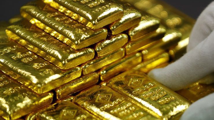 Vàng sụt giá do đồng USD tăng giá trở lại sau 5 ngày giảm liên tiếp - Ảnh: Reuters/CNBC.