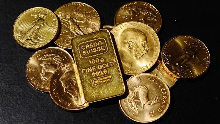 Giá vàng thế giới cao nhất 3 tuần sau khi FED phát tín hiệu không nâng lãi suất trong năm nay - Ảnh: Reuters/CNBC.