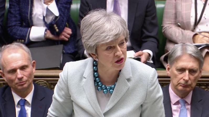 Thủ tướng Anh Theresa May tại Quốc hội ngày 25/3 - Ảnh: Reuters.
