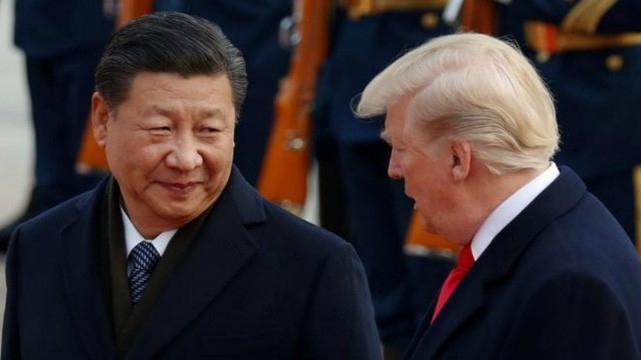 Chủ tịch Trung Quốc Tập Cận Bình (trái) và Tổng thống Mỹ Donald Trump - Ảnh: Reuters.