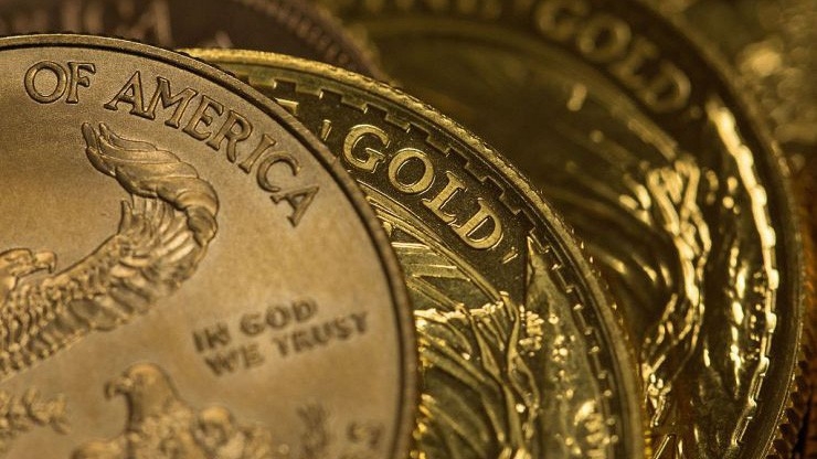 Đồng USD tăng giá sáng nay khiến giá vàng quốc tế giảm - Ảnh: Bloomberg/CNBC.