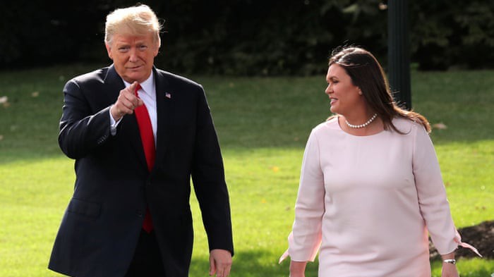 Tổng thống Donald Trump và thư ký báo chí Nhà Trắng Sarah Sanders - Ảnh: Reuters.