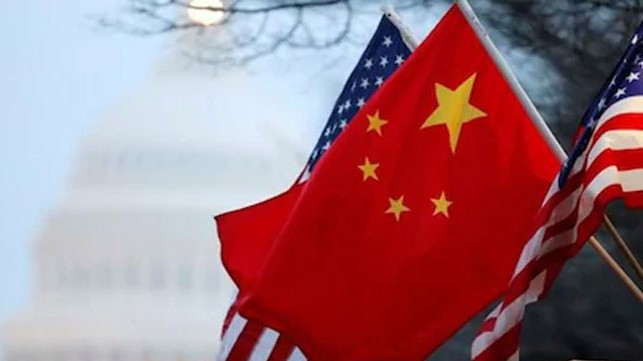 Chiến tranh thương mại Mỹ-Trung đã kéo dài hơn 1 năm - Ảnh: AP.