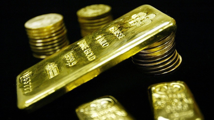Tính cả tuần, giá vàng thế giới giảm khoảng 1%, dưới sức ép từ sự hồi phục của đồng USD - Ảnh: Reuters.