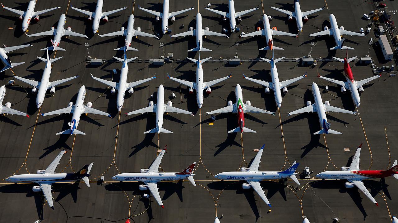 Những chiếc máy bay 737 Max bị đình bay được cất ở Boeing Field, Seatle, Mỹ - Ảnh: Reuters.