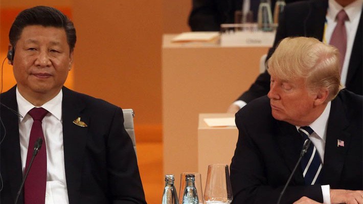 Chủ tịch Trung Quốc Tập Cận Bình (trái) và Tổng thống Mỹ Donald Trump - Ảnh: Reuters.