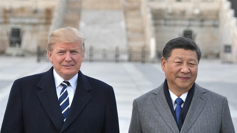 Tổng thống Mỹ Donald Trump (trái) và Chủ tịch Trung Quốc Tập Cận Bình trong chuyến thăm Bắc Kinh cuối năm 2017 của ông Trump - Ảnh: Reuters.