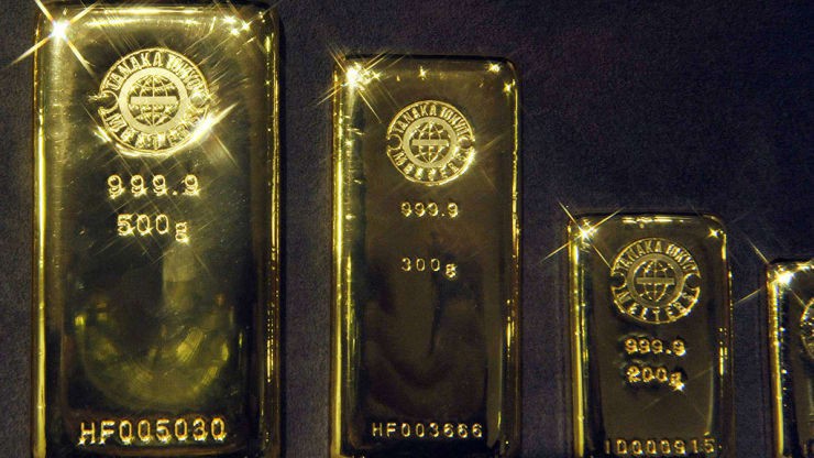 Vàng lại đang phát huy tốt vai trò kênh đầu tư an toàn trong bối cảnh chứng khoán toàn cầu sụt giảm - Ảnh: Getty/CNBC.