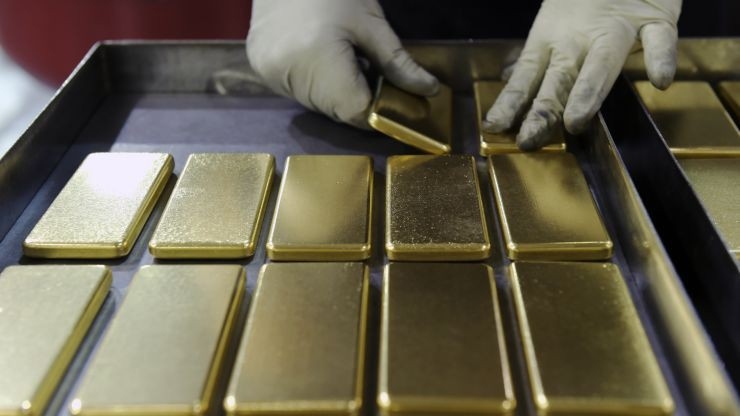 Vàng thế giới chững giá dưới 1.500 USD/oz do giới đầu tư chờ những thông tin mới - Ảnh: Reuters/CNBC.