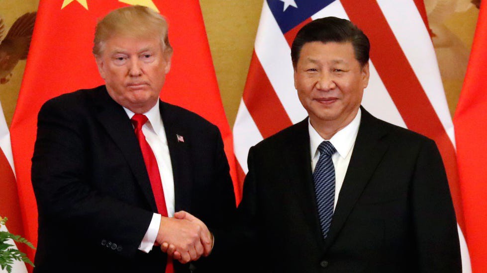 Tổng thống Mỹ Donald Trump (trái) và Chủ tịch Trung Quốc Tập Cận Bình - Ảnh: Reuters.