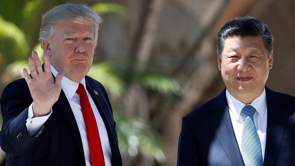 Tổng thống Mỹ Donald Trump (trái) và Chủ tịch Trung Quốc Tập Cận Bình - Ảnh: Reuters.