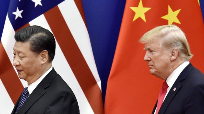 Chủ tịch Trung Quốc Tập Cận Bình (trái) và Tổng thống Mỹ Donald Trump - Ảnh: Kyodo.