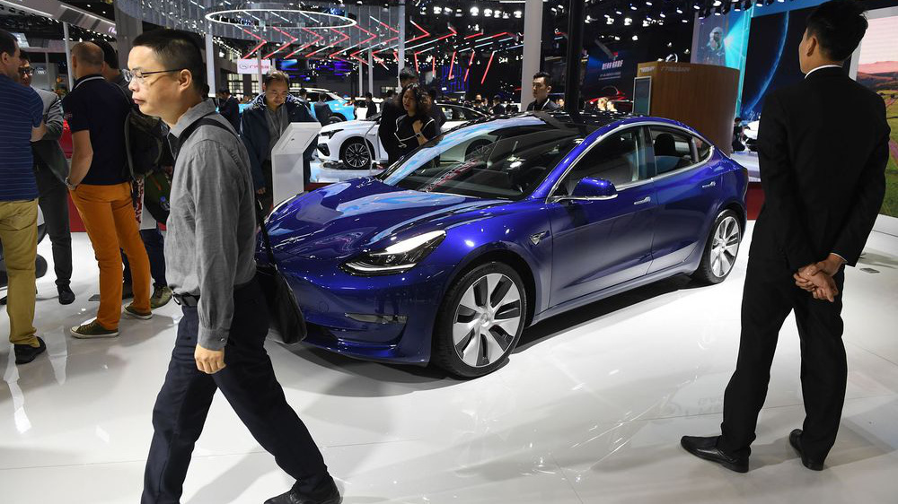Mẫu xe Model 3 của Tesla trong một sự kiện ở Trung Quốc - Ảnh: Bloomberg.