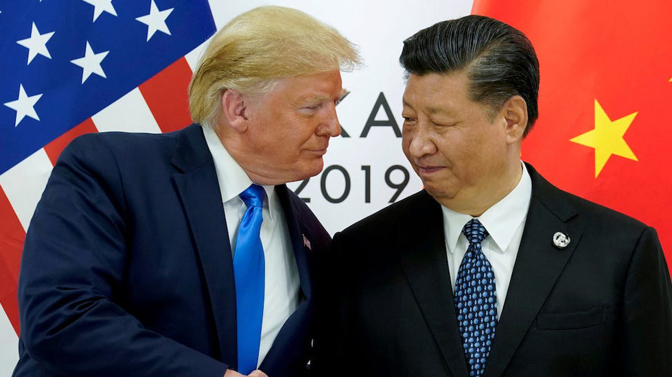 Tổng thống Mỹ Donald Trump (trái) và Chủ tịch Trung Quốc Tập Cận Bình - Ảnh: Reuters.