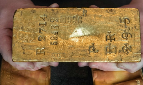 Vàng nhích giá, USD tự do giảm nhẹ