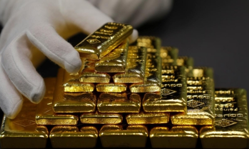 Vàng thế giới giữ đà giảm, trong nước tăng nhẹ