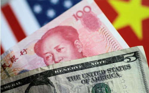 Trên thực tế, giới phân tích cho rằng rủi ro lớn hơn không nằm ở nợ trái
 phiếu phát hành bằng USD mà chính là nợ bằng đồng nội tệ của Trung 
Quốc - Ảnh: Reuters. 