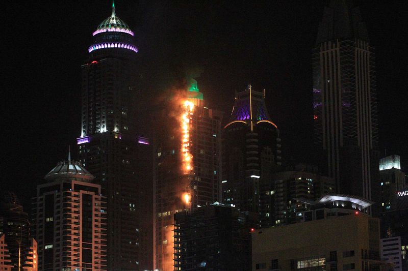 Chung cư Torch Tower ở Dubai bị cháy ngày 4/8 - Ảnh: Getty/Bloomberg.<br>