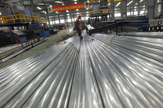 Sau hơn hai năm thực hiện, Nghị định 124 được xem là đã “phát huy tác dụng”, trong đó việc thuế suất thuế thu nhập doanh nghiệp phổ thông hạ từ 28% xuống 25% đã góp phần thu hút vốn đầu tư trực tiếp nước ngoài, khuyến khích phát triển sản xuất kinh doanh - Ảnh: Reuters.