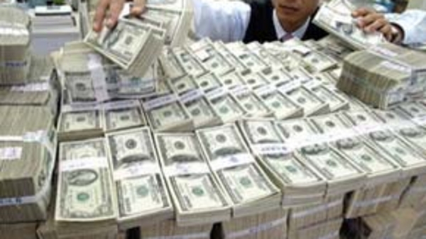 Nới biên độ tỷ giá ảnh hưởng thế nào đến lạm phát?