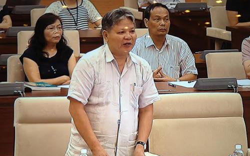 Bộ trưởng Bộ Tư pháp Hà Hùng Cường trình dự án Luật Đấu giá tài sản.<br>