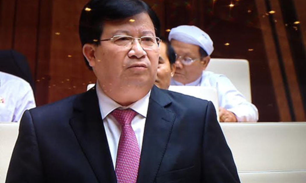 Bộ trưởng Bộ Xây dựng Trịnh Đình Dũng báo cáo trước Quốc hôi về nhà 8B Lê Trực.<br>