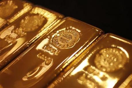 Vùng cản 1.280-1.285 USD/oz đang tỏ ra khá mạnh đối với giá vàng - Ảnh: Reuters.