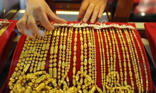 Vàng tăng giá mạnh sau quyết định của FED