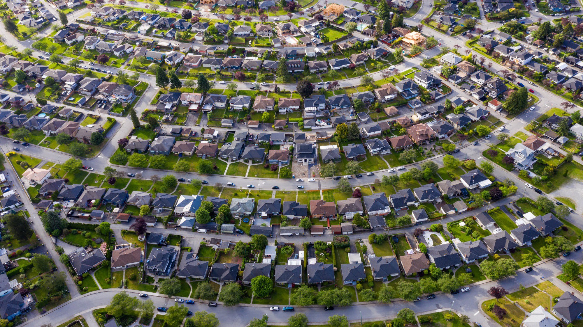 Kết quả nghiên cứu cho thấy Canada và New Zealand đang có giá nhà cao so với lương ở mức cao nhất thế giới và có xu hướng thiếu bền vững nhất - Ảnh: Bloomberg.