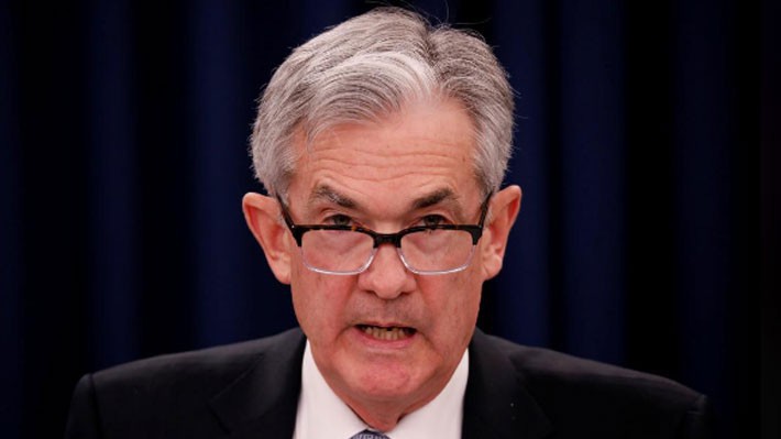 Chủ tịch FED Jerome Powell trong cuộc họp báo ngày 21/3, sau khi FED nâng lãi suất - Ảnh: Reuters.