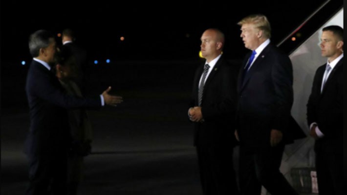 Những hình ảnh đầu tiên của ông Trump và ông Kim Jong Un ở Singapore - Ảnh 2.