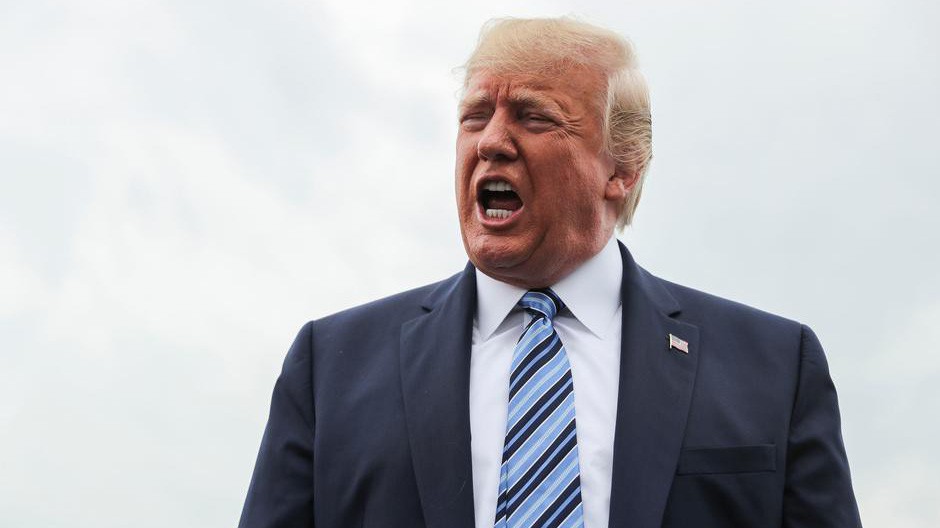 Tổng thống Mỹ Donald Trump phát biểu trước báo giới ngày 13/8 - Ảnh: Reuters.