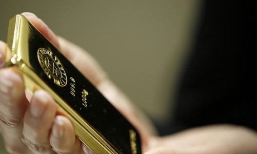 Vàng hồi giá, USD tự do đi ngang