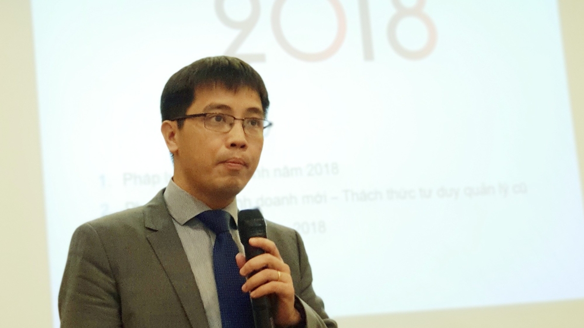 Ông Đậu Anh Tuấn, Trưởng ban Pháp chế VCCI trình bày khái quát báo cáo dòng chảy pháp luật kinh doanh 2018.