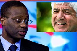 Tổng giám đốc Prudential, ông Tidjane Thiam (trái) và tổng giám đốc AIG Robert Benmosche (góc trên, phải) - Ảnh: Reuters.