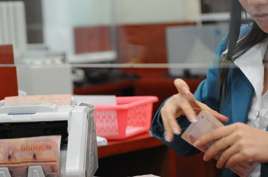 Theo Thông tư, các tổ chức tín dụng thực hiện cho vay bằng VND phải niêm yết công khai lãi suất cho vay ở mức hợp lý - Ảnh: Việt Tuấn.