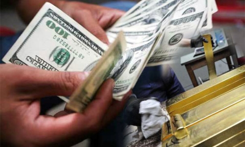 Giá vàng, USD bật tăng sau quyết định điều chỉnh tỷ giá