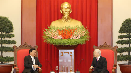 Tổng Bí thư, Chủ tịch nước Nguyễn Phú Trọng tiếp Thủ tướng Lào Thongloun Sisoulith ngày 6/12/2020 - Ảnh: TTXVN